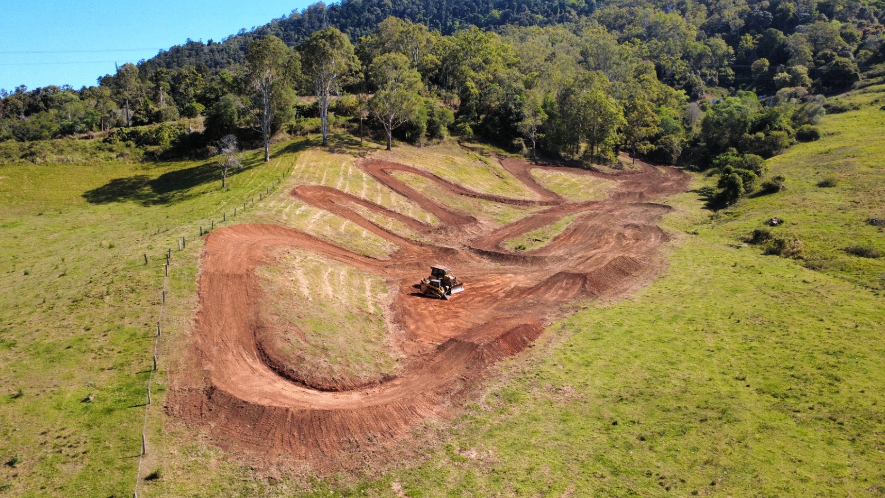 Freshly shaped motocross jump lip in raking light