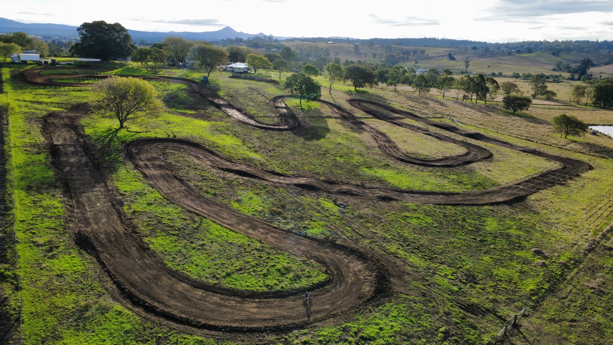 Junior rider on a private family motocross track built by Full Throttle Earthworks